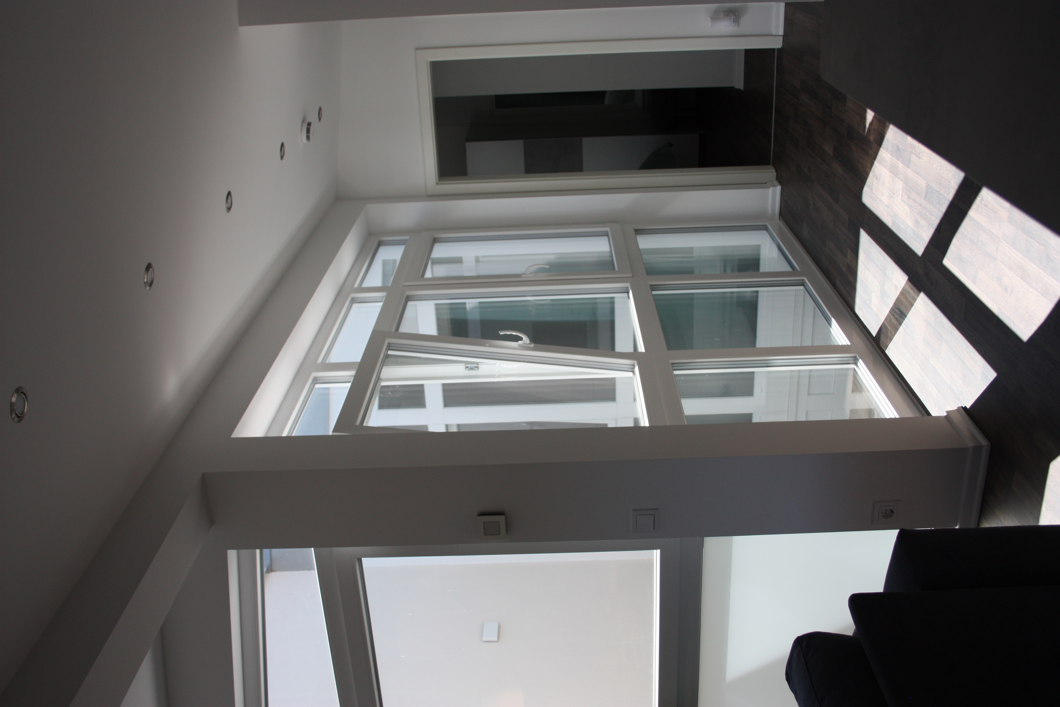 Wohnzimmer Detail mit Wandleuchte
